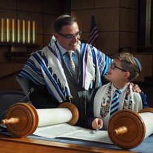 A rabbi leading a Jewish bar mitzvah service.