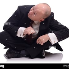 A person ducking to avoid an incoming object