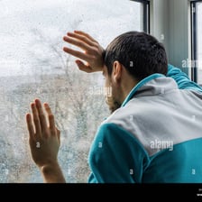 A person reacting sadly to disappointing news