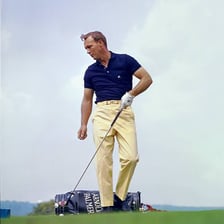 Arnold Palmer posing in golf attire