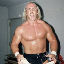 Hulk Hogan posing as a professional wrestler.
