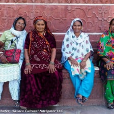 People wearing colorful traditional saris in India