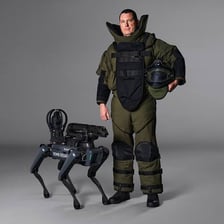 A bomb-disposal robot examining a suspicious device.
