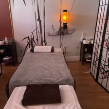 Person receiving a relaxing foot massage