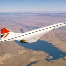 A Concorde supersonic passenger aircraft displayed on a runway or tarmac.