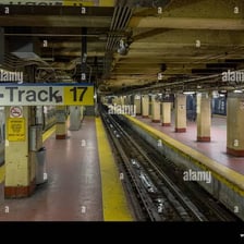 Railroad tracks and trains inside a major Penn Station terminal