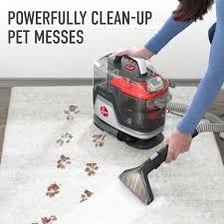 A vacuum cleaner being used on a carpet
