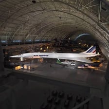 A Concorde supersonic jet displayed in an aviation museum