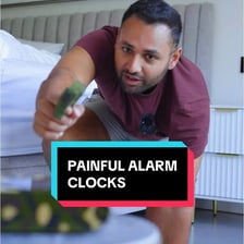 A person reacting with alarm to a loud warning sound.