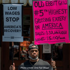 Workers advocating for pay that covers basic living expenses.