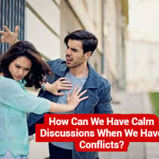 Two people having a calm conversation after an argument.