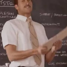 A teacher calling student names during classroom roll call.