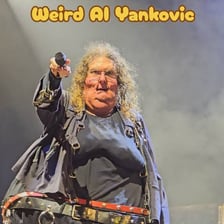 Weird Al Yankovic performing onstage.