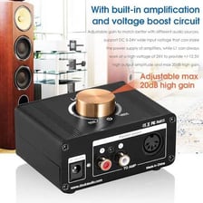 An audio amplifier with its volume being turned up.