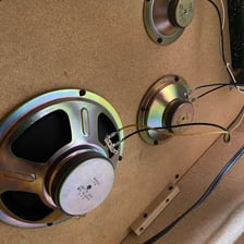 A vintage radio receiving a static-filled broadcast