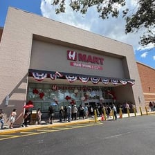 A storefront of the H Mart Korean-American grocery chain