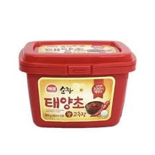 Korean gochujang paste alongside a traditional jjimjilbang sauna setting