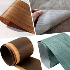 A thin sheet of wood veneer covering a surface.
