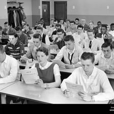 High school seniors seated at desks during a standardized exam