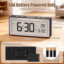 AAA batteries being inserted into a small clock