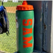 A Gatorade bottle showing the word Gatorade on its label