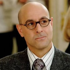 Stanley Tucci portraying Nigel in The Devil Wears Prada