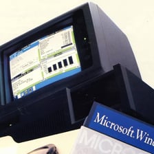 An early personal computer displaying the Microsoft Windows interface.