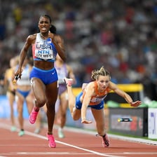 Athletes competing closely in a race