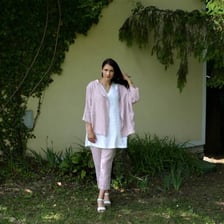 Flax plants pictured with a linen jacket.