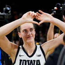 Caitlin Clark playing basketball for Iowa