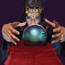 Fortune teller gazing into a crystal ball