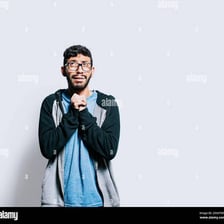 A person making an earnest plea with clasped hands.