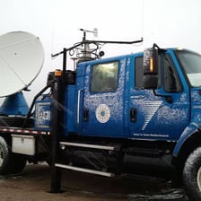 A weather radar system monitors a storm.