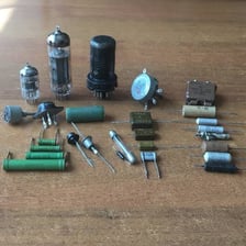 A vacuum-tube diode associated with an antique radio