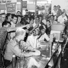 Protesters seated at a lunch counter during a sit-in