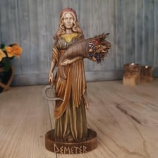 A classical depiction of Demeter, the Greek goddess of the harvest