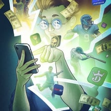 A person using a phone to place a sports bet