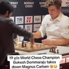 A chess player winning a game against an opponent.