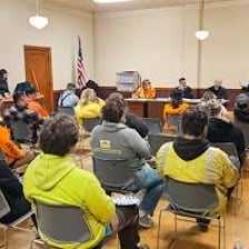 Labor union members gathered at a meeting.