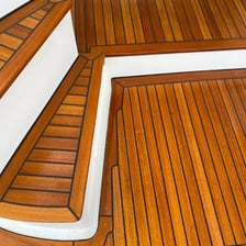 A sailboat deck made from teak wood.