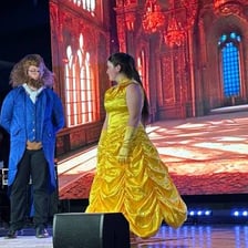 A stage scene representing music, dance, and drama