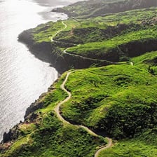 The Hana Highway winding along the coast of Maui