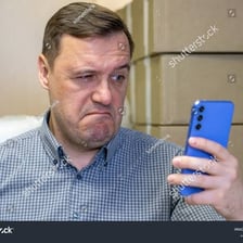 A frustrated person reacting with exasperation
