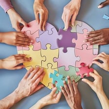 Puzzle pieces fitting together