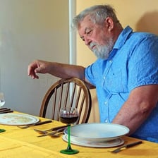 A person choosing not to disturb an object