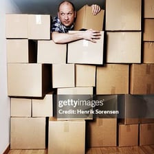 A person casually looking through objects while investigating