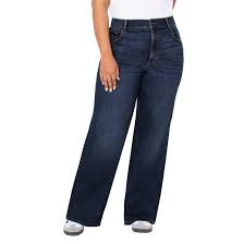 A pair of visibly worn blue jeans with faded areas.