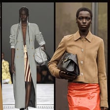 A high-end designer handbag displayed in a fashion setting