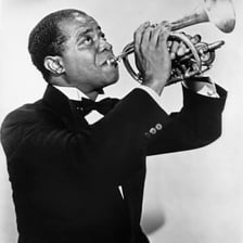 Louis Armstrong playing trumpet