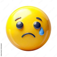 Happy and sad emoji faces depicted with tears